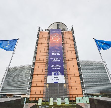 The Berlaymont building with a banner of the new Commission of Ursula von der Leyen