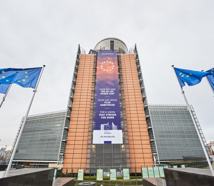 The Berlaymont building with a banner of the new Commission of Ursula von der Leyen